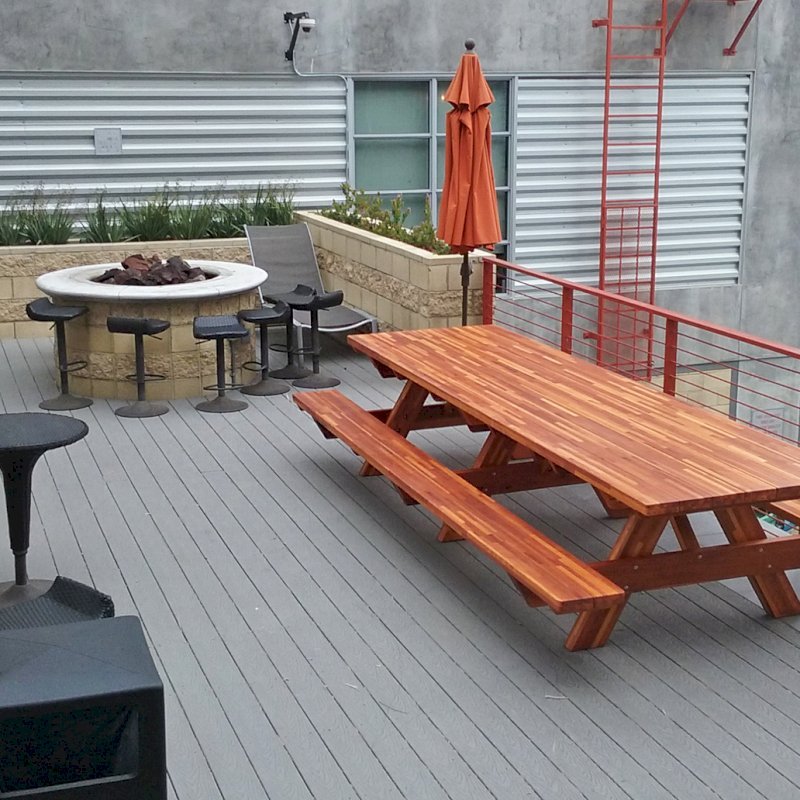 Forever Picnic Tables (Attached Benches) (Options: 12' L, 40 1/4" W, Side Benches, Mosaic Eco-Wood, Standard Tabletop, Slightly Rounded Corners, No Umbrella Hole, Transparent Premium Sealant, No ADA Accessible). Photo Courtesy of K. Ellerbroek of Marina Del Rey, CA. Forever Picnic Tables (Attached Benches) (Options: 12' L, 40 1/4" W, Side Benches, Mosaic Eco-Wood, Standard Tabletop, Slightly Rounded Corners, No Umbrella Hole, Transparent Premium Sealant, No ADA Accessible). Photo Courtesy of K. Ellerbroek of Marina Del Rey, CA.
