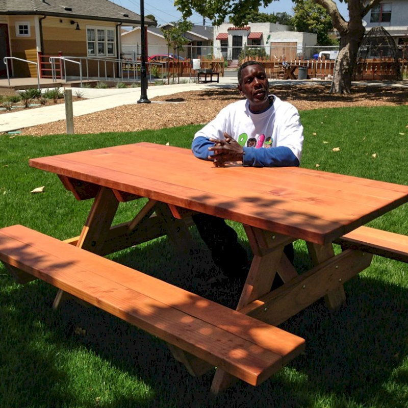 Forever Picnic Tables (Attached Benches) (Options: 6' L, 34 1/2" W, Side Benches, California Redwood, Standard Tabletop, SlightlyRounded Corners, No Umbrella Hole, Transparent Premium Sealant). Photo Courtesy of Pogo Park of Richmond, CA (www.pogopark.org). Forever Picnic Tables (Attached Benches) (Options: 6' L, 34 1/2" W, Side Benches, California Redwood, Standard Tabletop, SlightlyRounded Corners, No Umbrella Hole, Transparent Premium Sealant). Photo Courtesy of Pogo Park of Richmond, CA (www.pogopark.org).