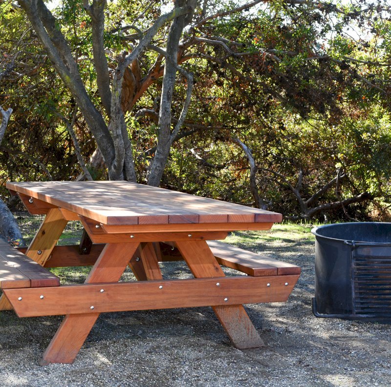 Forever Picnic Tables (Attached Benches) (Options: 8' L, 34 1/2" W, Side Benches, California Redwood, Standard Tabletop, Slightly Rounded Corners, No Umbrella Hole, Transparent Premium Sealant, ADA Accessible). Located at El Capitan State Beach near Santa Barbara, CA part of a 90 table installation completed in 2015. Forever Picnic Tables (Attached Benches) (Options: 8' L, 34 1/2" W, Side Benches, California Redwood, Standard Tabletop, Slightly Rounded Corners, No Umbrella Hole, Transparent Premium Sealant, ADA Accessible). Located at El Capitan State Beach near Santa Barbara, CA part of a 90 table installation completed in 2015.