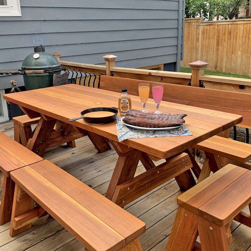 Forever Picnic Table (Unattached Benches) (Options: 7' L, 34 ½" W, Side and End Benches, California Redwood, 1 Full Length Fullback Bench on One Side, and 2 Half Length Picnic Benches on the Other Side, Standard Tabletop, Squared Corners, 2" Diameter Umbrella Hole, Transparent Premium Sealant). Photo Courtesy of I. Miller of Longmont, Colorado. Forever Picnic Table (Unattached Benches) (Options: 7' L, 34 ½" W, Side and End Benches, California Redwood, 1 Full Length Fullback Bench on One Side, and 2 Half Length Picnic Benches on the Other Side, Standard Tabletop, Squared Corners, 2" Diameter Umbrella Hole, Transparent Premium Sealant). Photo Courtesy of I. Miller of Longmont, Colorado.