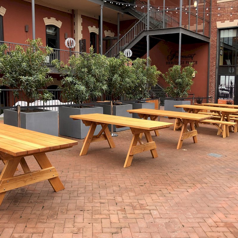 Forever Picnic Tables (Unattached Benches) (Options: 7' L, 34 ½" W, Some Table with No Seating and Some with Side Benches, Douglas-fir,1 Full Length Side Bench Per Side, Standard Tabletop, Slightly Rounded Corners, No Umbrella Hole, Transparent Premium Sealant). Photo also shows some Mendocino and Napa Planters. Photo Courtesy of A. Frost. Installed at Ghirardelli Square, West Plaza Beer Garden, located at 900 North Point Street at the corner of Beach & Larkin Streets, San Francisco, CA. Forever Picnic Tables (Unattached Benches) (Options: 7' L, 34 ½" W, Some Table with No Seating and Some with Side Benches, Douglas-fir,1 Full Length Side Bench Per Side, Standard Tabletop, Slightly Rounded Corners, No Umbrella Hole, Transparent Premium Sealant). Photo also shows some Mendocino and Napa Planters. Photo Courtesy of A. Frost. Installed at Ghirardelli Square, West Plaza Beer Garden, located at 900 North Point Street at the corner of Beach & Larkin Streets, San Francisco, CA.