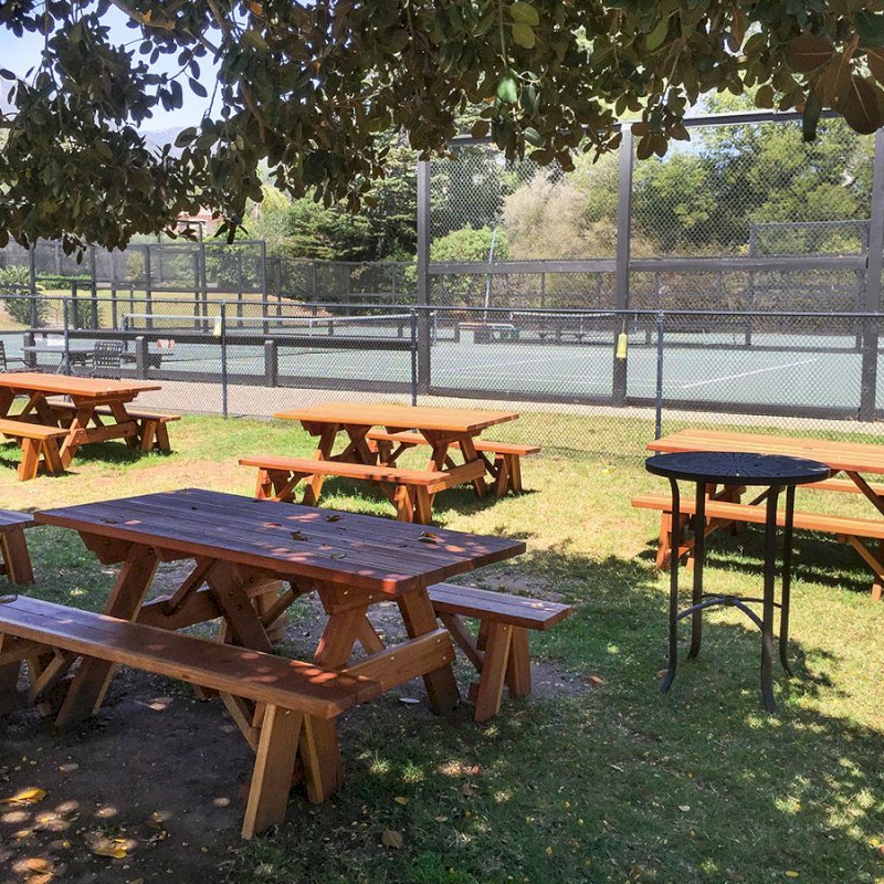 Forever Picnic Tables (Unattached Benches) (Options: 6' L, 34 ½" W, Side Benches, California Redwood, 1 Full Length Side Bench Per Side, Standard Tabletop, Squared Corners, No Umbrella Hole, Transparent Premium Sealant). Photo Courtesy of The Knowlwood Tennis Club of Santa Barbara, CA Forever Picnic Tables (Unattached Benches) (Options: 6' L, 34 ½" W, Side Benches, California Redwood, 1 Full Length Side Bench Per Side, Standard Tabletop, Squared Corners, No Umbrella Hole, Transparent Premium Sealant). Photo Courtesy of The Knowlwood Tennis Club of Santa Barbara, CA