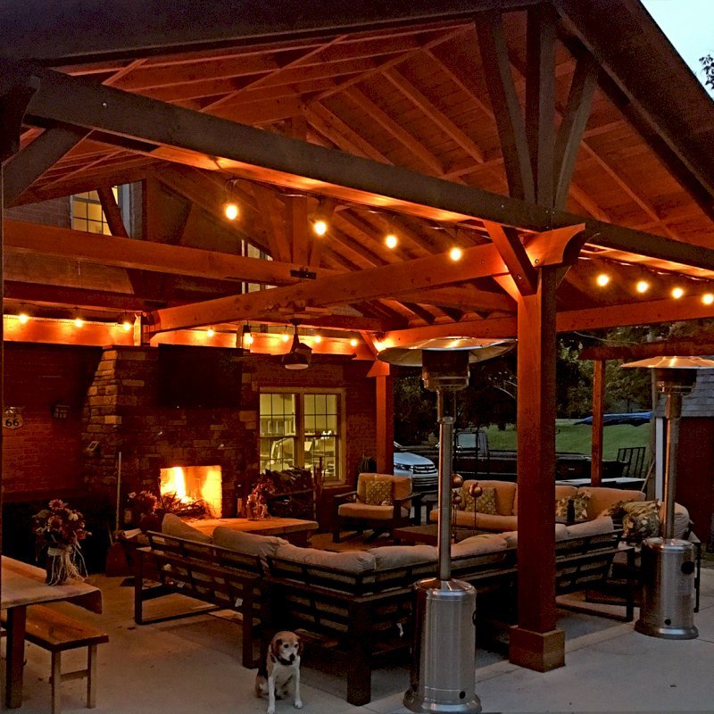 Custom Forever Porch Pavilion (Options: 30' L x 22' W, Douglas-fir, 5 Post Anchor Kit for Concrete, 1 Ceiling Fan Base, Transparent Premium Sealant). Because of the depth of the pavilion, posts up against the house were used for structural reasons. Photo Courtesy of A. Offutt of New Albany, Indiana. Custom Forever Porch Pavilion (Options: 30' L x 22' W, Douglas-fir, 5 Post Anchor Kit for Concrete, 1 Ceiling Fan Base, Transparent Premium Sealant). Because of the depth of the pavilion, posts up against the house were used for structural reasons. Photo Courtesy of A. Offutt of New Albany, Indiana.