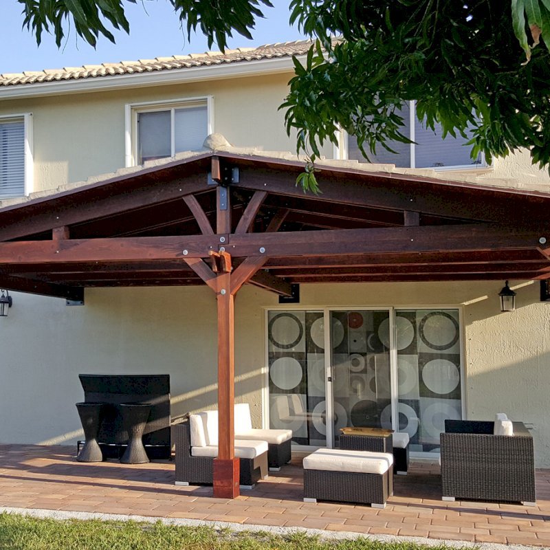Forever Porch Pavilion (Options: 12' L x 25' W, California Redwood, 3-post Kit Gale-Wind, No Electrical Wiring Trim, 9ft Posts Height, No Ceiling Fan Base, No Curtain Rods, No Privacy Panels, Transparent Premium Sealant). Photo Courtesy of Carol Varela of Florida. Forever Porch Pavilion (Options: 12' L x 25' W, California Redwood, 3-post Kit Gale-Wind, No Electrical Wiring Trim, 9ft Posts Height, No Ceiling Fan Base, No Curtain Rods, No Privacy Panels, Transparent Premium Sealant). Photo Courtesy of Carol Varela of Florida.