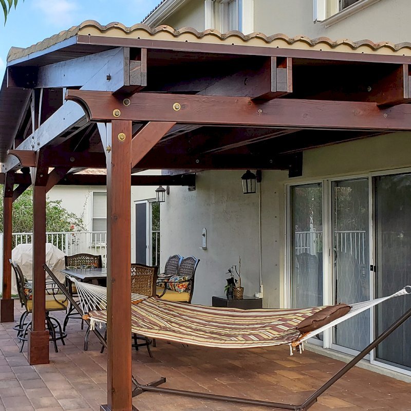 Forever Porch Pavilion (Options: 12' L x 25' W, California Redwood, 3-post Kit Gale-Wind, No Electrical Wiring Trim, 9ft Posts Height, No Ceiling Fan Base, No Curtain Rods, No Privacy Panels, Transparent Premium Sealant). Photo Courtesy of Carol Varela of Florida. Forever Porch Pavilion (Options: 12' L x 25' W, California Redwood, 3-post Kit Gale-Wind, No Electrical Wiring Trim, 9ft Posts Height, No Ceiling Fan Base, No Curtain Rods, No Privacy Panels, Transparent Premium Sealant). Photo Courtesy of Carol Varela of Florida.
