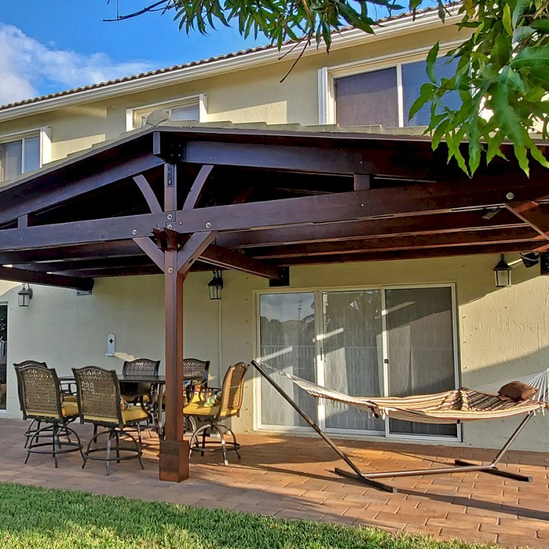 Forever Porch Pavilion (Options: 12' L x 25' W, California Redwood, 3-post Kit Gale-Wind, No Electrical Wiring Trim, 9ft Posts Height, No Ceiling Fan Base, No Curtain Rods, No Privacy Panels, Transparent Premium Sealant). Photo Courtesy of Carol Varela of Florida. Forever Porch Pavilion (Options: 12' L x 25' W, California Redwood, 3-post Kit Gale-Wind, No Electrical Wiring Trim, 9ft Posts Height, No Ceiling Fan Base, No Curtain Rods, No Privacy Panels, Transparent Premium Sealant). Photo Courtesy of Carol Varela of Florida.
