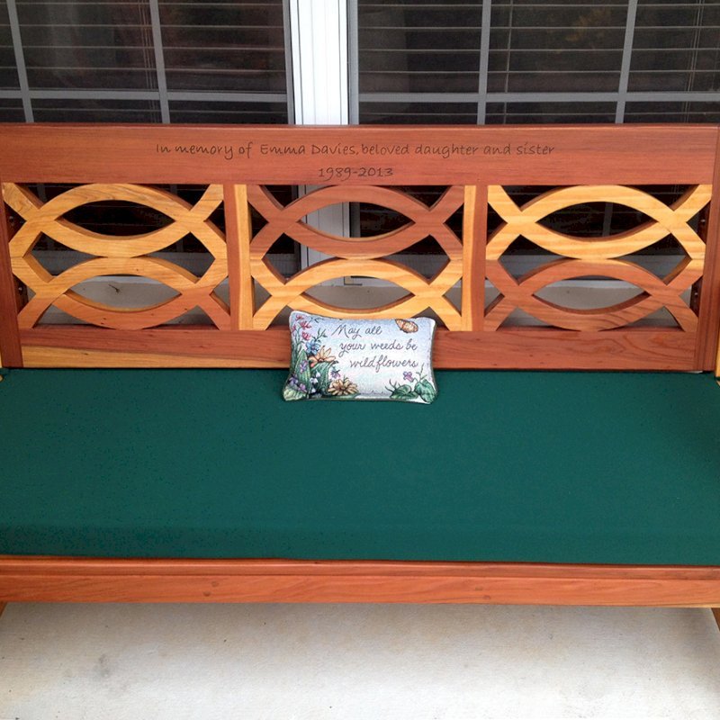 Hennell Wooden Garden Bench (Options: 5 ft, California Redwood, Forest Green Cushion, Custom Engraving, Transparent Premium Sealant). Photo Courtesy of Elizabeth Davies of The Villages, Florida. Hennell Wooden Garden Bench (Options: 5 ft, California Redwood, Forest Green Cushion, Custom Engraving, Transparent Premium Sealant). Photo Courtesy of Elizabeth Davies of The Villages, Florida.