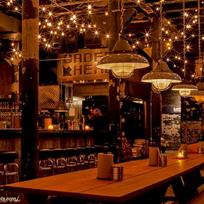 Heritage Large Wooden Picnic Table at "Green Street Smoked Meats" Restaurant, 112 N Green St, Chicago, IL 60607 (Options: Several Sizes, 34 1/2" W, Unattached Side Benches, Transparent Premium Sealant). Photo Courtesy of Jennifer Whang of Chicago, Illinois.
