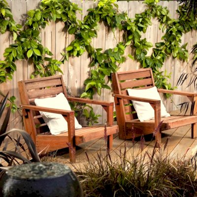 Kari's Modern Wood Chair (Options: Old-Growth Redwood, Original Low Seat Design (8" H seat), No Cushion, Transparent Premium Sealant) Custom throw cushion available upon request. Photo Courtesy of Ms. Kari Hamilton, Cardiff By the Sea, CA.