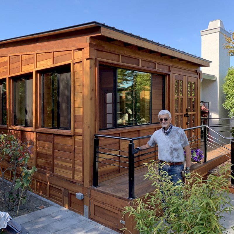 Custom Backyard Cabin (Options: 18' L, 16' W, California Redwood, Sugar Pine Internal Walls and Ceiling, Windows Purchased Locally, With 2 3' x 5' Skylights, Custom Roof, Horizontal Siding, Custom French Door without Screens, Complete Floor & Deck, Custom Railings and Steps, Electrical Wire Trim on the Walls, Transparent Premium Sealant). Photo Courtesy of A. Ramon of South San Francisco, California. Custom Backyard Cabin (Options: 18' L, 16' W, California Redwood, Sugar Pine Internal Walls and Ceiling, Windows Purchased Locally, With 2 3' x 5' Skylights, Custom Roof, Horizontal Siding, Custom French Door without Screens, Complete Floor & Deck, Custom Railings and Steps, Electrical Wire Trim on the Walls, Transparent Premium Sealant). Photo Courtesy of A. Ramon of South San Francisco, California.