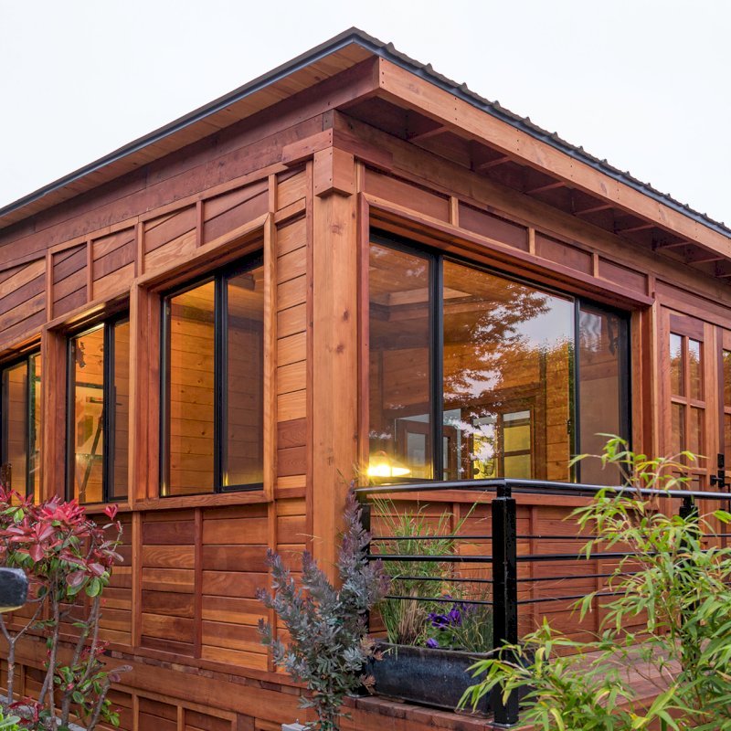 Custom Backyard Cabin (Options: 18' L, 16' W, California Redwood, Sugar Pine Internal Walls and Ceiling, Windows Purchased Locally, With 2 3' x 5' Skylights, Custom Roof, Horizontal Siding, Custom French Door without Screens, Complete Floor & Deck, Custom Railings and Steps, Electrical Wire Trim on the Walls, Transparent Premium Sealant). Photo Courtesy of A. Ramon of South San Francisco, California. Custom Backyard Cabin (Options: 18' L, 16' W, California Redwood, Sugar Pine Internal Walls and Ceiling, Windows Purchased Locally, With 2 3' x 5' Skylights, Custom Roof, Horizontal Siding, Custom French Door without Screens, Complete Floor & Deck, Custom Railings and Steps, Electrical Wire Trim on the Walls, Transparent Premium Sealant). Photo Courtesy of A. Ramon of South San Francisco, California.