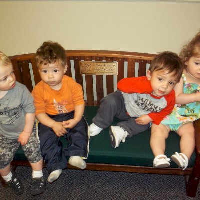 In Loving Memory of Abigail Buckner. Kid's Wood Luna Bench (Options: Old-Growth Redwood, Forest Green Cushion, No Engraving, Custom Plaque Inlaid, Transparent Premium Sealant). Photo Courtesy of Julie Buckner of Shakopee, Minnesota.