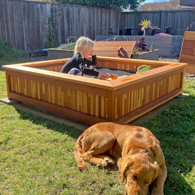 La Playa Sandbox (Options: 60" L x 60" W x 15" H, Redwood Mosaic, Tongue and Grooved Lid, Transparent Premium Sealant). Photo Courtesy of D. Sund-Caldwell of Crescent City, CA.