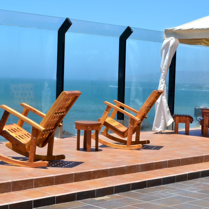 2 Lighthouse Rocking Chairs (Options: California Redwood, No Cushion, Transparent Premium Sealant). Photo also shows Round Side Table and Folding Adirondack Chair with Ottoman. 2 Lighthouse Rocking Chairs (Options: California Redwood, No Cushion, Transparent Premium Sealant). Photo also shows Round Side Table and Folding Adirondack Chair with Ottoman.