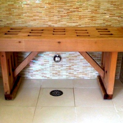 Lighthouse Wooden Shower Bench (Options: 3 ft L x 17 3/4" W x 20" H, Mature Redwood, No Engraving, Unfinished). Photo shows typical finish fading after 1 year in the shower without sealant.