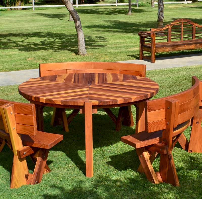 Lisa's Retro Outdoor Patio Table (Options: 5' Diameter, Custom Fullback Arc Benches, California Redwood, Standard Tabletop, No Lazy Susan, Umbrella Hole, Transparent Premium Sealant). Photo also shows Lutyens Bench in background. Lisa's Retro Outdoor Patio Table (Options: 5' Diameter, Custom Fullback Arc Benches, California Redwood, Standard Tabletop, No Lazy Susan, Umbrella Hole, Transparent Premium Sealant). Photo also shows Lutyens Bench in background.