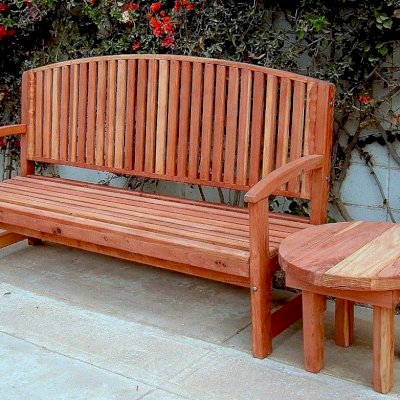 Luna Wood Bench (Bench Options: 6 ft, California Redwood, No Cushion, No Engraving, Transparent Premium Sealant) and Round Side Table (Options: California Redwood, Unfinished).