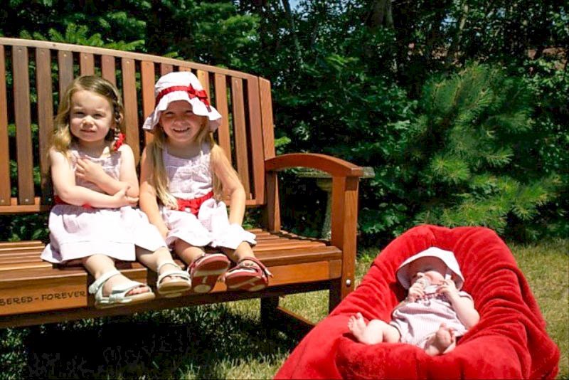 Luna Wood Bench (Options: 5 ft, Old-Growth Redwood, No Cushion, Custom Engraving, Transparent Premium Sealant). Photo Courtesy of Carla Cody of Lakeland, FL. Luna Wood Bench (Options: 5 ft, Old-Growth Redwood, No Cushion, Custom Engraving, Transparent Premium Sealant). Photo Courtesy of Carla Cody of Lakeland, FL.