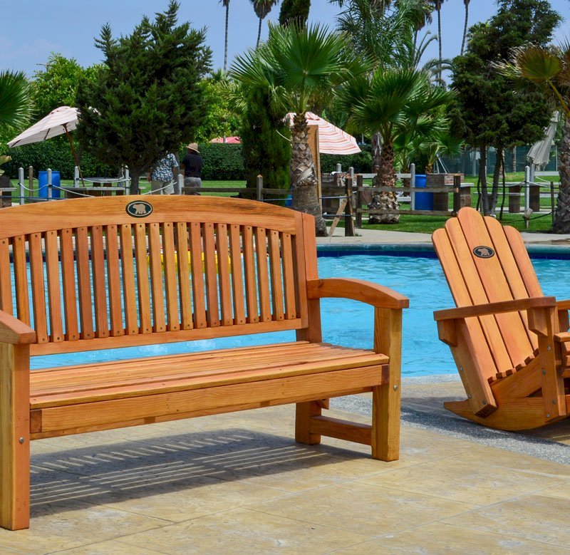 Luna Memorial Bench (Options: 5 ft, Douglas-fir, No Cushion, No Engraving, Custom Plaque Provided by Customer, Transparent Premium Sealant). Photo also shows an Adirondack Rocking Chair. Luna Memorial Bench (Options: 5 ft, Douglas-fir, No Cushion, No Engraving, Custom Plaque Provided by Customer, Transparent Premium Sealant). Photo also shows an Adirondack Rocking Chair.