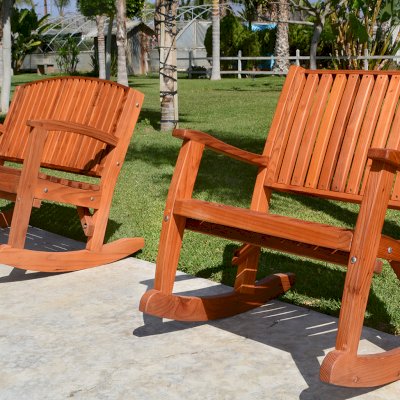 Luna Wood Rocking Bench (Options: 4ft L, Tall, Mature Redwood, No Cushion, No Engraving, Transparent Premium Sealant). Photo Also Shows a Ruth Rocking Chair Extra Wide. 
