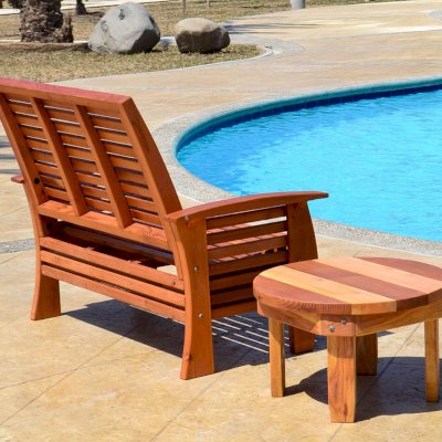 Marazul Wood Outdoor Loveseat (Options: Mature Redwood, No Cushion, Transparent Premium Sealant), Marazul Chair and Ashley Round Side Table.