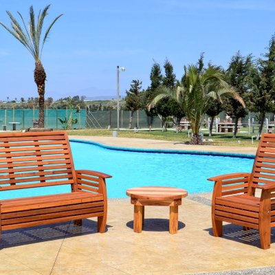 Marazul Wooden Beach Chair (Options: Mature Redwood, No Cushion, Transparent Premium Sealant), Marazul Loveseat and Ashley Round Side Table.