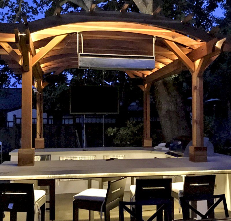 Marin Outdoor Kitchen Pergola (Options: 14' L x 14' Arc W, California Redwood, Unattached, 2 Post Electrical Wiring Trim, 4 Post Anchor Kit for Stone, No Ceiling Fan Base, No Privacy, No Curtain Rods, 9 ft Post Height (front posts wrapped with masonry), Transparent Premium Sealant). Photo Courtesy of C. Funkhouser of Hillsborough, California. Marin Outdoor Kitchen Pergola (Options: 14' L x 14' Arc W, California Redwood, Unattached, 2 Post Electrical Wiring Trim, 4 Post Anchor Kit for Stone, No Ceiling Fan Base, No Privacy, No Curtain Rods, 9 ft Post Height (front posts wrapped with masonry), Transparent Premium Sealant). Photo Courtesy of C. Funkhouser of Hillsborough, California.