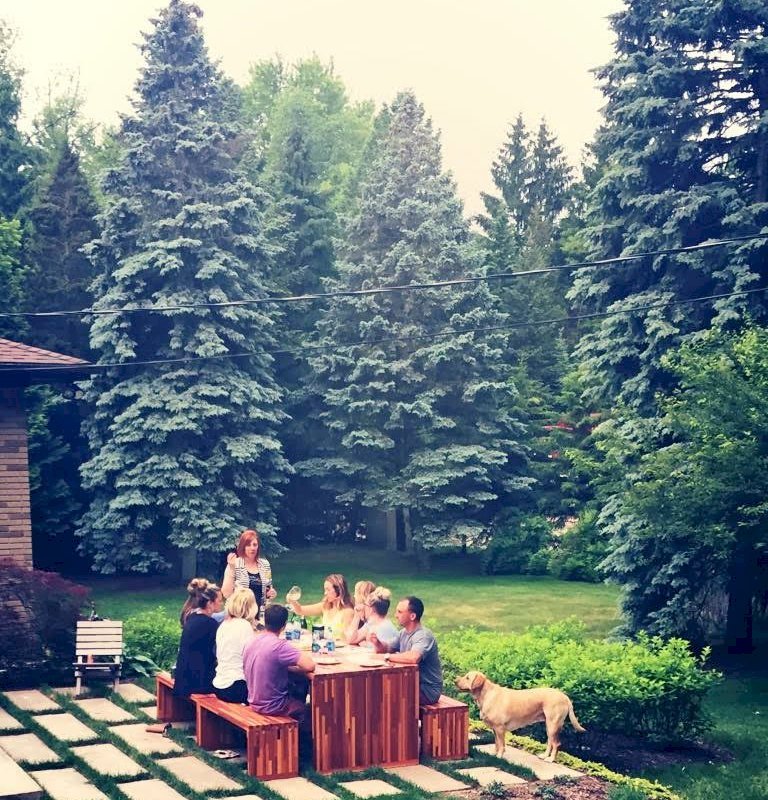 Maynard Modern Redwood Patio Table (Options: 8' L, 34 1/2" W Tabletop, Side Benches, Mosaic Eco-Wood, 2 Half Length Maynard Benches Per Side, Standard Tabletop, 1 5/8" Diameter Umbrella Hole, Transparent Premium Sealant). Photo Courtesy of Sarah D'Agostino of Novi, Michigan. Maynard Modern Redwood Patio Table (Options: 8' L, 34 1/2" W Tabletop, Side Benches, Mosaic Eco-Wood, 2 Half Length Maynard Benches Per Side, Standard Tabletop, 1 5/8" Diameter Umbrella Hole, Transparent Premium Sealant). Photo Courtesy of Sarah D'Agostino of Novi, Michigan.