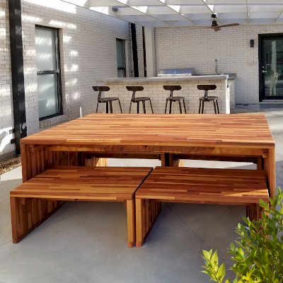 Maynard Modern Redwood Patio Table (Options: 7' L, 34 1/2" W Tabletop, Side Benches, Mosaic Redwood, 2 Half Length Maynard Benches Per Side, Standard Tabletop, No Umbrella Hole, Transparent Premium Sealant). Photo Courtesy of Wesley Robinson of Mansfield, TX.