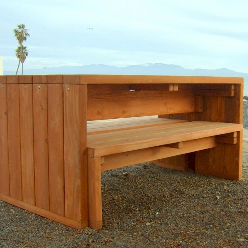 SIDE VIEW OF TABLE WITH BENCHES UNDERNEATH: Maynard Modern Redwood Patio Table (Options: 6' L, 34 1/2" W Tabletop, Side Benches, Douglas-fir, 1 Full Length Side Bench/Side, Standard Tabletop, No Umbrella Hole, Transparent Premium Sealant). SIDE VIEW OF TABLE WITH BENCHES UNDERNEATH: Maynard Modern Redwood Patio Table (Options: 6' L, 34 1/2" W Tabletop, Side Benches, Douglas-fir, 1 Full Length Side Bench/Side, Standard Tabletop, No Umbrella Hole, Transparent Premium Sealant).