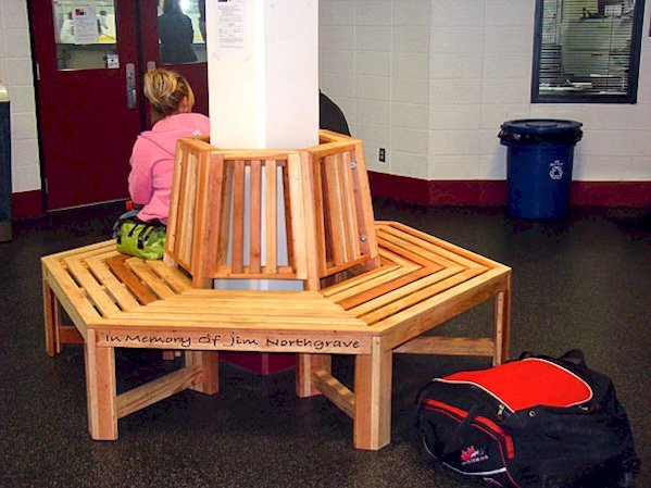 Memorial Natural Redwood Tree Bench (Options: 7 ft, California Redwood, No Beverage Ledge, No Cushions, Custom Engraving, Transparent Premium Sealant). Tree benches are equally great around indoor support columns! Memorial Natural Redwood Tree Bench (Options: 7 ft, California Redwood, No Beverage Ledge, No Cushions, Custom Engraving, Transparent Premium Sealant). Tree benches are equally great around indoor support columns!