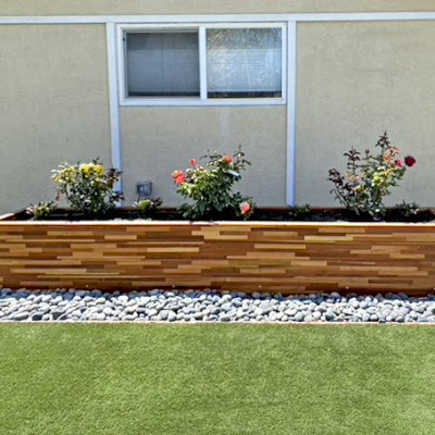 Mendocino Planters (Options: 144" L, 24" W x 24" H, Mosaic Redwood, 1 3/4-inch Feet, No Casters, No Trellis, Interior and Exterior of Box with Sealant (No Growing Vegetables), Transparent Premium Sealant). Photo Courtesy of B. Bond of Newark, California.