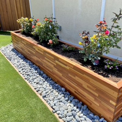 Mendocino Planters (Options: 144" L, 24" W x 24" H, Mosaic Redwood, 1 3/4-inch Feet, No Casters, No Trellis, Interior and Exterior of Box with Sealant (No Growing Vegetables), Transparent Premium Sealant). Photo Courtesy of B. Bond of Newark, California.