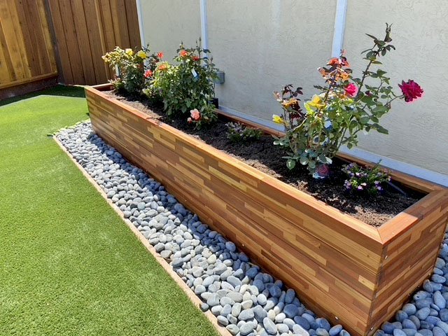 Mendocino Planters (Options: 144" L, 24" W x 24" H, Mosaic Eco-Wood, 1 3/4-inch Feet, No Casters, No Trellis, No Growing Vegetables, Transparent Premium Sealant). Photo Courtesy of B. Bond of Newark, California. Mendocino Planters (Options: 144" L, 24" W x 24" H, Mosaic Eco-Wood, 1 3/4-inch Feet, No Casters, No Trellis, No Growing Vegetables, Transparent Premium Sealant). Photo Courtesy of B. Bond of Newark, California.