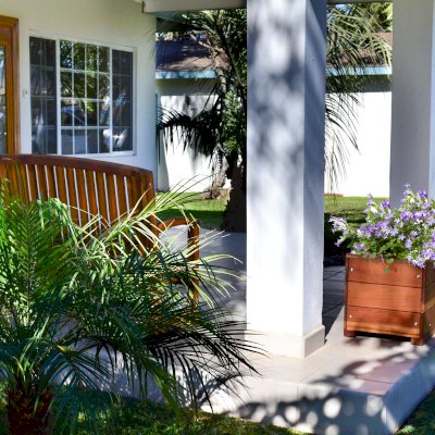 Mendocino Planters (Options: 60" L, 24" W x 24" H, California Redwood, 1 3/4-inch Feet, No Trellis, Interior and Exterior of Box with Sealant (No Growing Vegetables), Transparent Premium Sealant) and Luna Bench. 