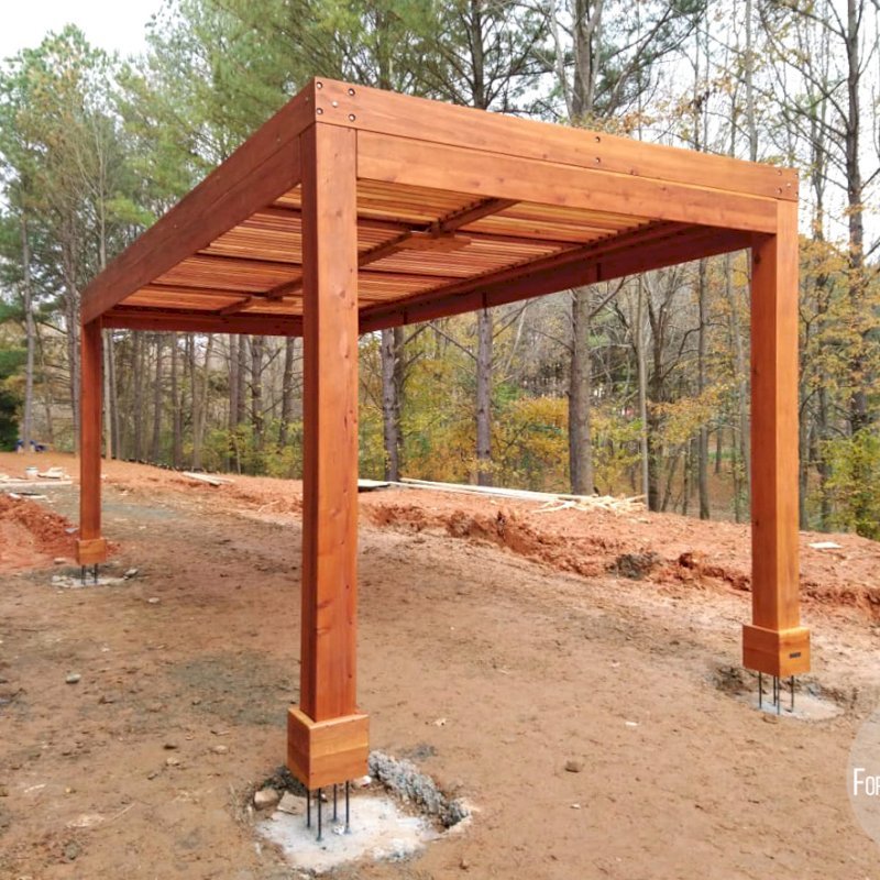 Modern Louvered Garden Pergola (Options: 22' L x 10' W, 8" x 8" Posts, Mobile Louvers, California Redwood, 9.5 ft H, No Electrical Wiring Trim, 4 Post Anchor Kit for Gale-Wind, No post decorative trims, No Ceiling Fan Base, Transparent Premium Sealant). The pergola is "up in the air" so that the final hardscape can be poured over the footings so that there is no joint showing and the final hardscape will be seamless. Photo Courtesy of M. Graff of Atlanta, Georgia. Modern Louvered Garden Pergola (Options: 22' L x 10' W, 8" x 8" Posts, Mobile Louvers, California Redwood, 9.5 ft H, No Electrical Wiring Trim, 4 Post Anchor Kit for Gale-Wind, No post decorative trims, No Ceiling Fan Base, Transparent Premium Sealant). The pergola is "up in the air" so that the final hardscape can be poured over the footings so that there is no joint showing and the final hardscape will be seamless. Photo Courtesy of M. Graff of Atlanta, Georgia.