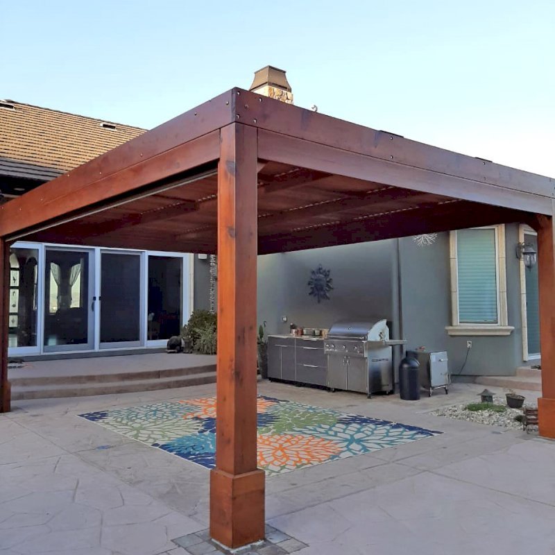 Modern Louvered Garden Pergola (Options: 20' L x 15' W, 8" x 8" Posts, Mobile Louvers, Mature Redwood, 9.5 ft H, 1 Electrical Wiring Trim, 4-Post Anchor Kit for Hurricane, No post decorative trims, 1 Ceiling Fan Base, Transparent Premium Sealant). Photo Courtesy of D. Ruprecht of Hollister, CA. Modern Louvered Garden Pergola (Options: 20' L x 15' W, 8" x 8" Posts, Mobile Louvers, Mature Redwood, 9.5 ft H, 1 Electrical Wiring Trim, 4-Post Anchor Kit for Hurricane, No post decorative trims, 1 Ceiling Fan Base, Transparent Premium Sealant). Photo Courtesy of D. Ruprecht of Hollister, CA.