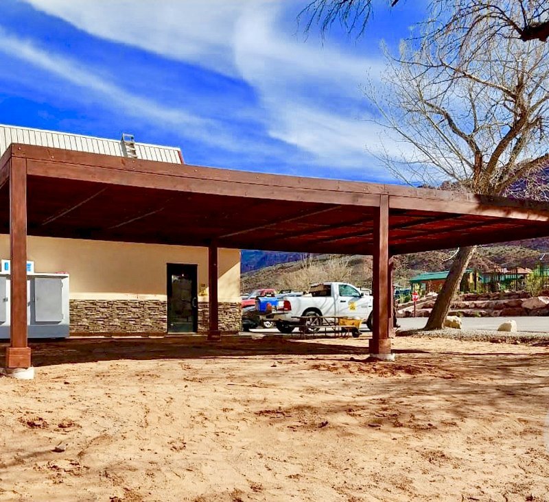 Modern Louvered Garden Pergola (Options: 40' L x 24' W, 8" x 8" Posts, Mobile Louvers, Douglas-fir, 9.5 ft H, No Electrical Wiring Trim, 4 Curtain Rods, 4 Post Anchor Kit for Concrete, No Post Decorative Trims, No Ceiling Fan Bases, Coffee-Stain Premium Sealant). Photo Courtesy of D. Tuzi of Moab, Utah. Modern Louvered Garden Pergola (Options: 40' L x 24' W, 8" x 8" Posts, Mobile Louvers, Douglas-fir, 9.5 ft H, No Electrical Wiring Trim, 4 Curtain Rods, 4 Post Anchor Kit for Concrete, No Post Decorative Trims, No Ceiling Fan Bases, Coffee-Stain Premium Sealant). Photo Courtesy of D. Tuzi of Moab, Utah.
