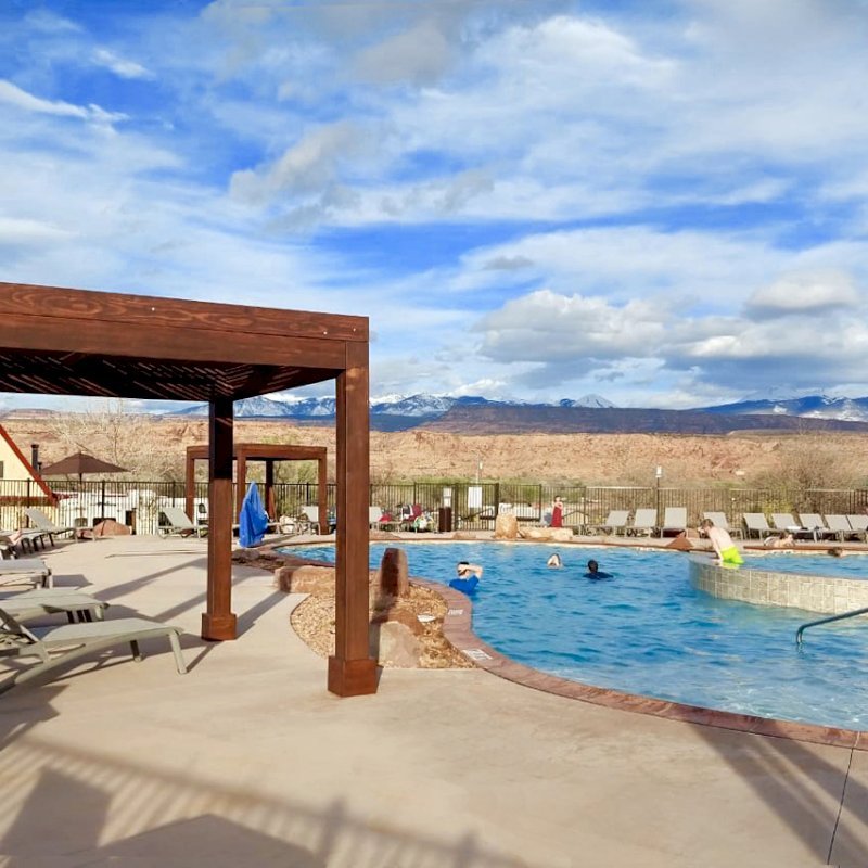 Modern Louvered Garden Pergola (Options: 10' L x 10' W, 8" x 8" Posts, Mobile Louvers, Douglas-fir, 9.5 ft H, No Electrical Wiring Trim, 4 Curtain Rods, 4 Post Anchor Kit for Concrete, No Post Decorative Trims, No Ceiling Fan Bases, Coffee-Stain Premium Sealant). Photo Courtesy of D. Tuzi of Moab, Utah. Modern Louvered Garden Pergola (Options: 10' L x 10' W, 8" x 8" Posts, Mobile Louvers, Douglas-fir, 9.5 ft H, No Electrical Wiring Trim, 4 Curtain Rods, 4 Post Anchor Kit for Concrete, No Post Decorative Trims, No Ceiling Fan Bases, Coffee-Stain Premium Sealant). Photo Courtesy of D. Tuzi of Moab, Utah.