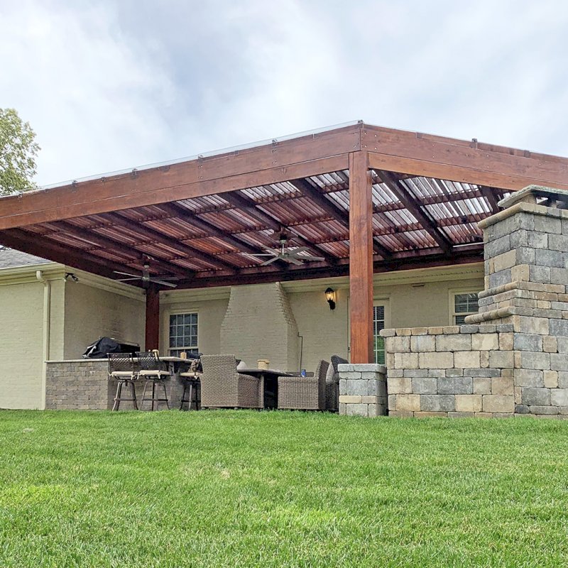 Custom Modern Louvered Garden Pergola (Options: 32' L x 18' W, 10" x 10" Posts, Mobile Louvers, Douglas-fir, 10 ft H, No Electrical Wiring Trim, No Curtain Rods, 6 Post Anchor Kit for Concrete, No Ceiling Fan Base, No Trim Kits for The Posts, Transparent Premium Sealant, with Rain Guard System for Waterproofing). Photo Courtesy of J. Cole of Louisville, Kentucky. Custom Modern Louvered Garden Pergola (Options: 32' L x 18' W, 10" x 10" Posts, Mobile Louvers, Douglas-fir, 10 ft H, No Electrical Wiring Trim, No Curtain Rods, 6 Post Anchor Kit for Concrete, No Ceiling Fan Base, No Trim Kits for The Posts, Transparent Premium Sealant, with Rain Guard System for Waterproofing). Photo Courtesy of J. Cole of Louisville, Kentucky.