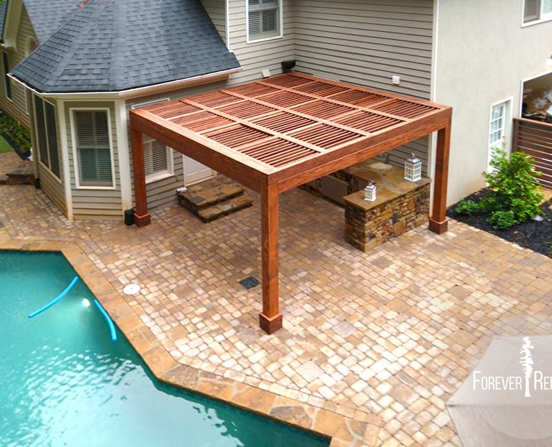 Modern Louvered Garden Pergola (Options: 15' L x 15' W, 8" x 8" Posts, Mobile Louvers, Douglas-fir, 9 ft H, 1 Electrical Wiring Trim, 2 Curtain Rods, 4 Post Anchor Kit for Concrete, No Post Decorative Trims, 1 Ceiling Fan Base, Coffee-Stain Premium Sealant). Photo Courtesy of J. Mcknight of Smyrna, Georgia. Modern Louvered Garden Pergola (Options: 15' L x 15' W, 8" x 8" Posts, Mobile Louvers, Douglas-fir, 9 ft H, 1 Electrical Wiring Trim, 2 Curtain Rods, 4 Post Anchor Kit for Concrete, No Post Decorative Trims, 1 Ceiling Fan Base, Coffee-Stain Premium Sealant). Photo Courtesy of J. Mcknight of Smyrna, Georgia.