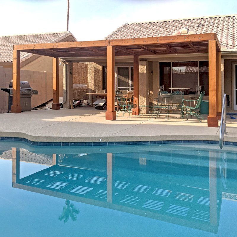 Modern Louvered Garden Pergola (Options: 24' L x 8' W, 8" x 8" Posts, Mobile Louvers, California Redwood, 8 ft H, No Electrical Wiring Trim, No Curtain Rods, 6 Post Anchor Kit for Concrete, No Post Decorative Trims, No Ceiling Fan Base, Transparent Premium Sealant). Photo Courtesy of K. St. John of Phoenix, Arizona. Modern Louvered Garden Pergola (Options: 24' L x 8' W, 8" x 8" Posts, Mobile Louvers, California Redwood, 8 ft H, No Electrical Wiring Trim, No Curtain Rods, 6 Post Anchor Kit for Concrete, No Post Decorative Trims, No Ceiling Fan Base, Transparent Premium Sealant). Photo Courtesy of K. St. John of Phoenix, Arizona.