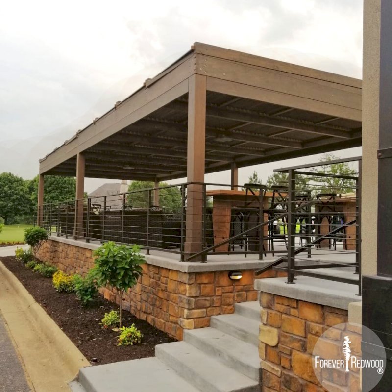 Modern Louvered Garden Pergola (Options: 44' L x 18' W, 8" x 8" Posts, Mobile Louvers, Douglas-fir, 10 ft H, No Electrical Wiring Trim, 4 Curtain Rods, 6 Post Anchor Kit for Concrete, With Clear Polycarbonate Roofing Atop Pergola Framing by Custom Request, No Post Decorative Trims, No Ceiling Fan Bases, Coffee-Stain Premium Sealant). Photo Courtesy of M. Hudson of Rogers, Arkansas. Modern Louvered Garden Pergola (Options: 44' L x 18' W, 8" x 8" Posts, Mobile Louvers, Douglas-fir, 10 ft H, No Electrical Wiring Trim, 4 Curtain Rods, 6 Post Anchor Kit for Concrete, With Clear Polycarbonate Roofing Atop Pergola Framing by Custom Request, No Post Decorative Trims, No Ceiling Fan Bases, Coffee-Stain Premium Sealant). Photo Courtesy of M. Hudson of Rogers, Arkansas.