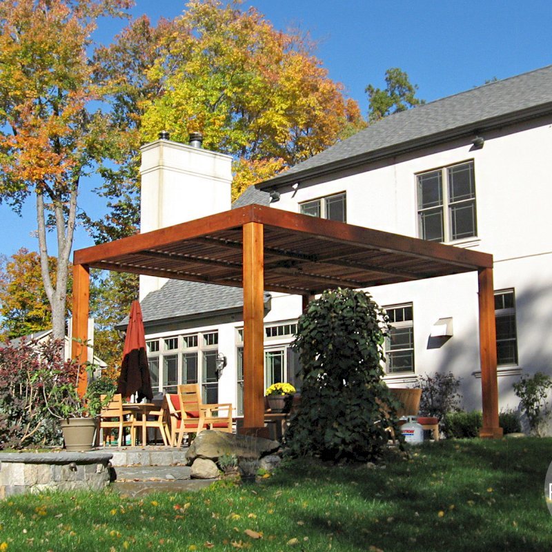 Modern Louvered Garden Pergola (Options: 18' L x 14' W, 8" x 8" Posts, Mobile Louvers, California Redwood, 9ft H, No Electrical Wiring Trim, 4 Post Anchor Kit for Stone, brick or Concrete, No post decorative trims, No Ceiling Fan Base, No Curtain Rods, Transparent Premium Sealant). Photo Courtesy of P. Falla of Putnam Valley, NY. Modern Louvered Garden Pergola (Options: 18' L x 14' W, 8" x 8" Posts, Mobile Louvers, California Redwood, 9ft H, No Electrical Wiring Trim, 4 Post Anchor Kit for Stone, brick or Concrete, No post decorative trims, No Ceiling Fan Base, No Curtain Rods, Transparent Premium Sealant). Photo Courtesy of P. Falla of Putnam Valley, NY.