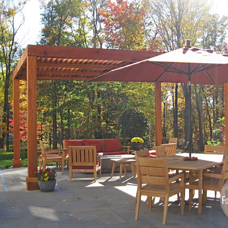 Modern Louvered Garden Pergola (Options: 18' L x 14' W, 8" x 8" Posts, Mobile Louvers, California Redwood, 9ft H, No Electrical Wiring Trim, 4 Post Anchor Kit for Stone, brick or Concrete, No post decorative trims, No Ceiling Fan Base, No Curtain Rods, Transparent Premium Sealant). Photo Courtesy of P. Falla of Putnam Valley, NY. Modern Louvered Garden Pergola (Options: 18' L x 14' W, 8" x 8" Posts, Mobile Louvers, California Redwood, 9ft H, No Electrical Wiring Trim, 4 Post Anchor Kit for Stone, brick or Concrete, No post decorative trims, No Ceiling Fan Base, No Curtain Rods, Transparent Premium Sealant). Photo Courtesy of P. Falla of Putnam Valley, NY.