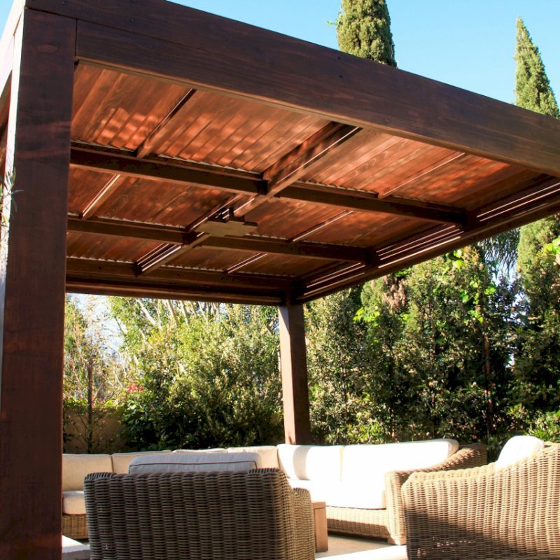 Modern Louvered Garden Pergola (Options: 16' L x 16' W, 10" x 10" Posts, Mobile Louvers, California Redwood, 9.5ft H, Electrical Wiring Trim for 1 Post, 4 Post Anchor Kit for Concrete, No post decorative trims, Add a Ceiling Fan Base, 4 Curtain Rods, Coffee Stain Sealant). Photo Courtesy of S. Gillin of Del Mar, CA. Modern Louvered Garden Pergola (Options: 16' L x 16' W, 10" x 10" Posts, Mobile Louvers, California Redwood, 9.5ft H, Electrical Wiring Trim for 1 Post, 4 Post Anchor Kit for Concrete, No post decorative trims, Add a Ceiling Fan Base, 4 Curtain Rods, Coffee Stain Sealant). Photo Courtesy of S. Gillin of Del Mar, CA.