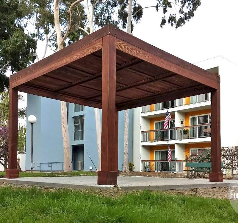 Modern Louvered Garden Pergola (Options: 14' L x 14' W, 8" x 8" Posts, Fixed Louvers, California Redwood, 9.5 ft H, No Electrical Wiring Trim, 4 Post Anchor Kit for Concrete, No post decorative trims, With a Ceiling Fan Base, Coffee-Stain Premium Sealant). Photo Courtesy of M. Ramirez of Long Beach, CA. Modern Louvered Garden Pergola (Options: 14' L x 14' W, 8" x 8" Posts, Fixed Louvers, California Redwood, 9.5 ft H, No Electrical Wiring Trim, 4 Post Anchor Kit for Concrete, No post decorative trims, With a Ceiling Fan Base, Coffee-Stain Premium Sealant). Photo Courtesy of M. Ramirez of Long Beach, CA.
