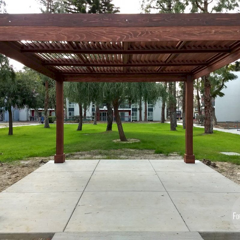 Modern Louvered Garden Pergola (Options: 14' L x 14' W, 8" x 8" Posts, Fixed Louvers, California Redwood, 9.5 ft H, No Electrical Wiring Trim, 4 Post Anchor Kit for Concrete, No post decorative trims, With a Ceiling Fan Base, Coffee-Stain Premium Sealant). Photo Courtesy of M. Ramirez of Long Beach, CA. Modern Louvered Garden Pergola (Options: 14' L x 14' W, 8" x 8" Posts, Fixed Louvers, California Redwood, 9.5 ft H, No Electrical Wiring Trim, 4 Post Anchor Kit for Concrete, No post decorative trims, With a Ceiling Fan Base, Coffee-Stain Premium Sealant). Photo Courtesy of M. Ramirez of Long Beach, CA.