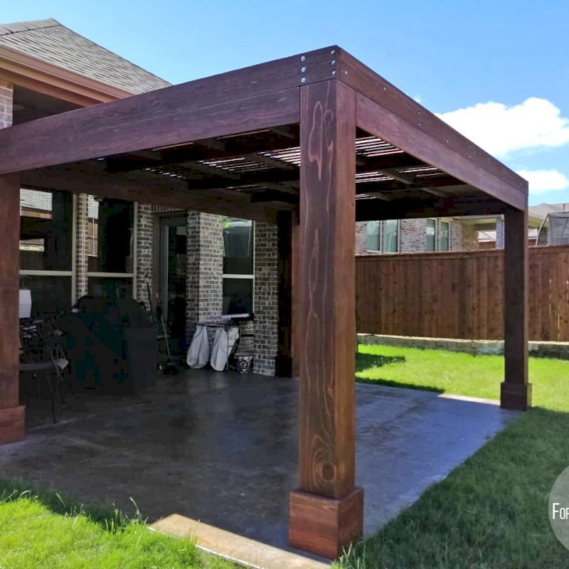 Modern Louvered Garden Pergola (Options: 16' L x 12' W, 10" x 10" Posts, Mobile Louvers, California Redwood, 9 ft H, 1 Electrical Wiring Trim, No Curtain Rods, 4 Post Anchor Kit for Concrete, No Post Decorative Trims, 1 Ceiling Fan Base, Coffee Stain Premium Sealant). Photo Courtesy of G. Moore of Wylie, Texas. Modern Louvered Garden Pergola (Options: 16' L x 12' W, 10" x 10" Posts, Mobile Louvers, California Redwood, 9 ft H, 1 Electrical Wiring Trim, No Curtain Rods, 4 Post Anchor Kit for Concrete, No Post Decorative Trims, 1 Ceiling Fan Base, Coffee Stain Premium Sealant). Photo Courtesy of G. Moore of Wylie, Texas.