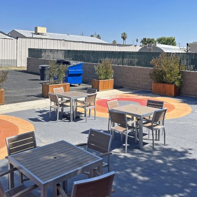 Napa Planters (Options: 48" L x 24" W x 24" H, California Redwood, 1-inch Feet, Transparent Premium Sealant). Photo Taken 1 Year After Installation. Photo Courtesy of D. Frans of Shafter, CA.